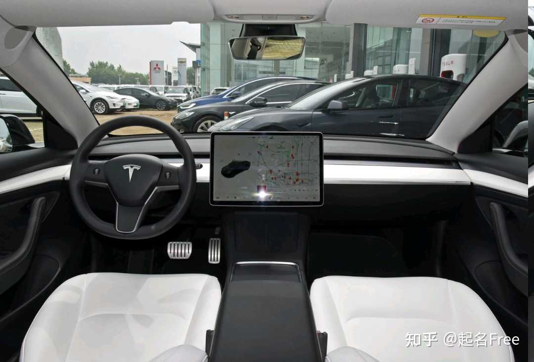 model3内饰表面简洁实则省成本的事大家都清楚