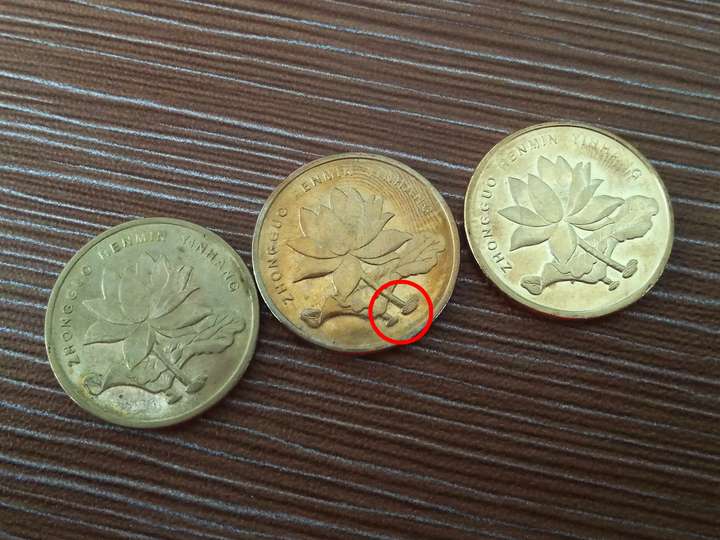 说五角硬币有五角星,从来没在意过,于是就瞅了一下,还真是!