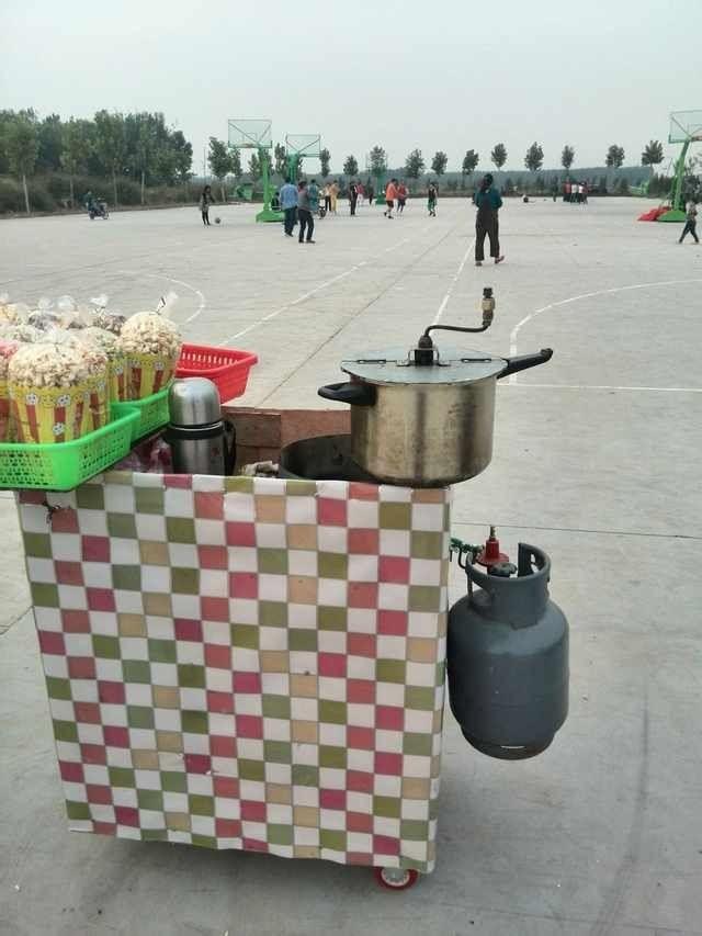 寒假摆摊卖爆米花,挣钱进藏?