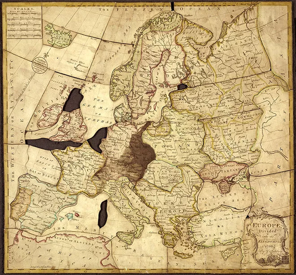 约翰·斯皮尔斯伯里 斯皮尔斯伯里将英国地图粘贴到薄木板上,再小心图片
