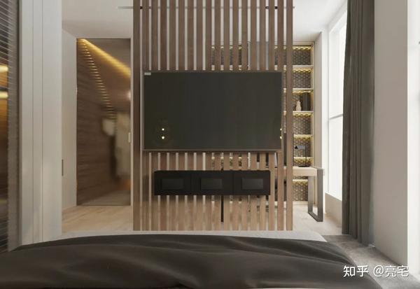 设计师巧妙地运用木栅栏电视机背景墙作为隔断来区分睡眠区域和工作