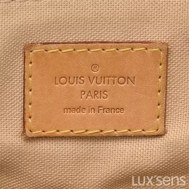"louis vuitton paris made in france 的字样,这是所有正品 lv 标签