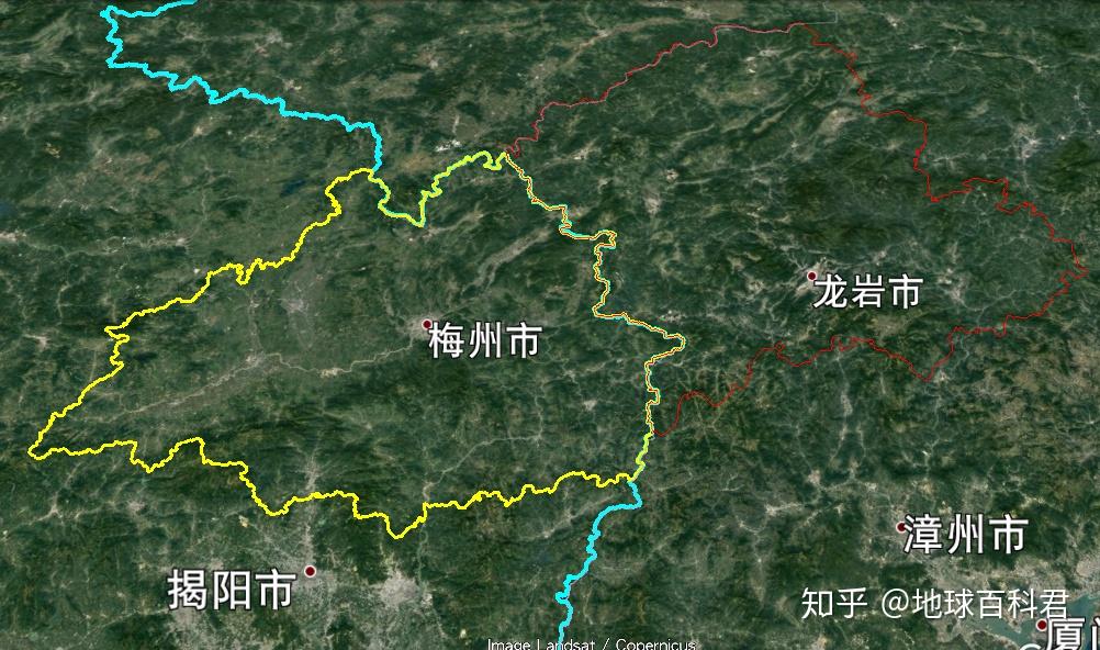 山区地形影响,但这并不完全对,比如隔壁福建的龙岩市,跟梅州一衣带水