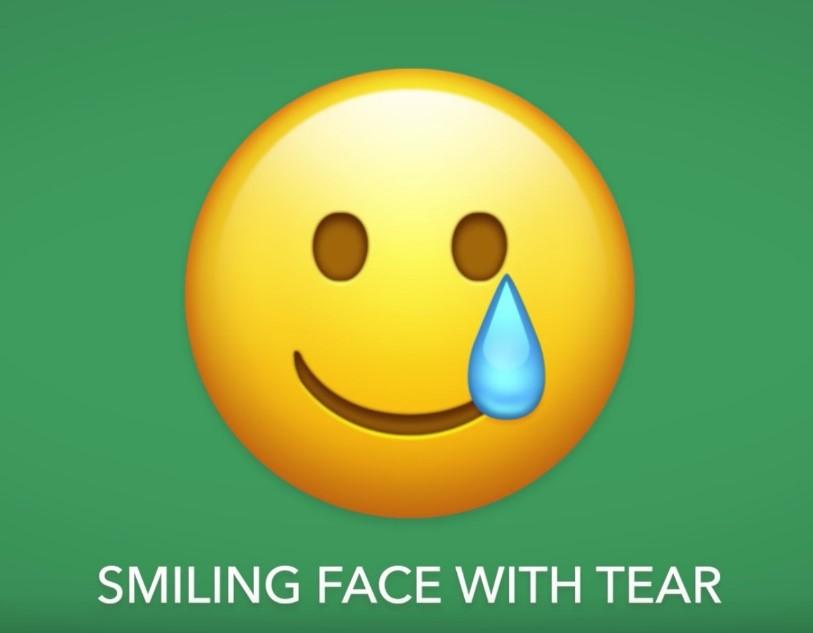 也许是因为笑哭了实在太好用了,今年emoji还新增了它的好兄弟(smiling