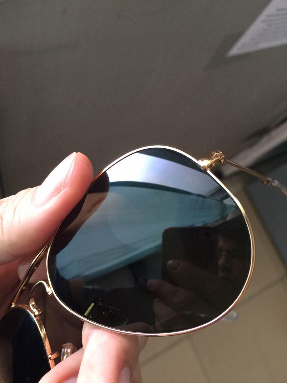 如何清除偏光太阳镜片上贴纸后留下的印? - 眼