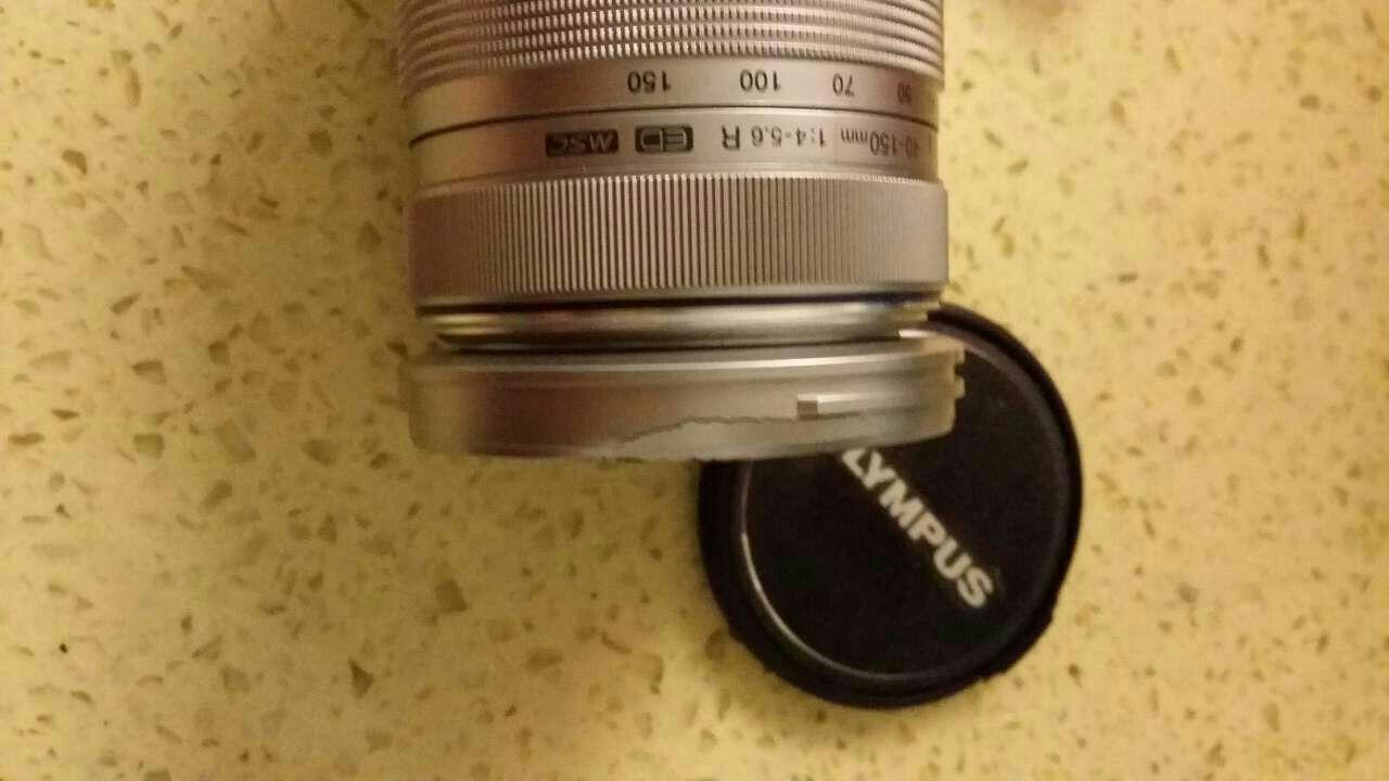 微单相机镜头被朋友给摔了,说是拿走修,拿回来