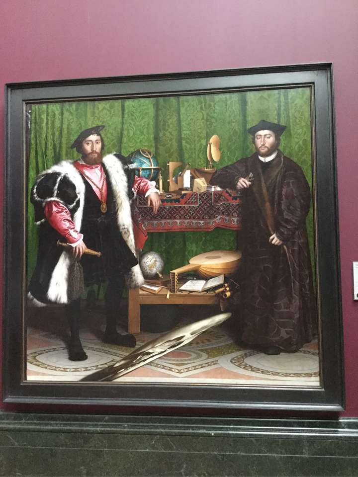 油画大使们寓意何在尤其是那个扭曲的头骨又是何含意