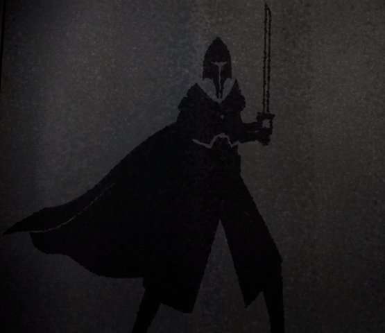 曼达洛人第八集里最后boss手里拿的闪瞎眼的是光剑吗