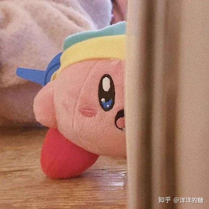一个粉色圆球是什么动漫人物?
