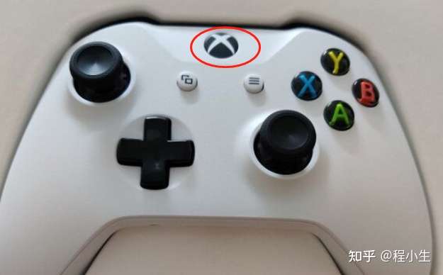 xbox手柄中间那个xbox标志的按键是干什么用的?