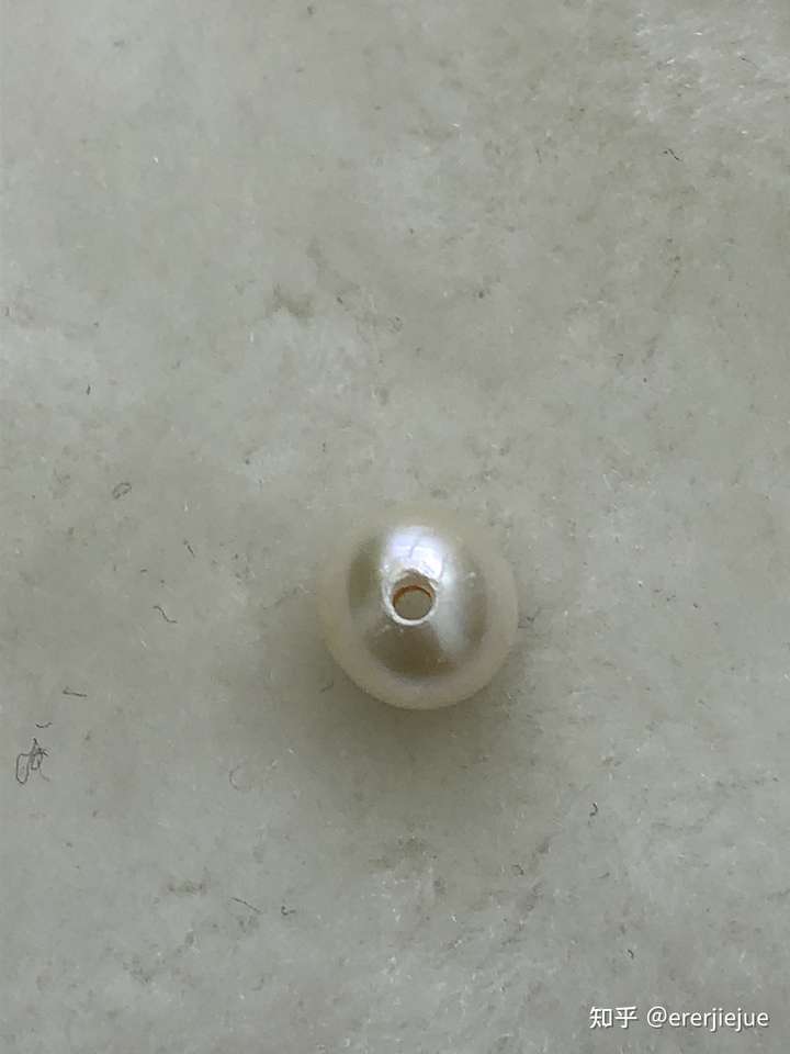 珍珠变形了.是什么原因造成的呢?
