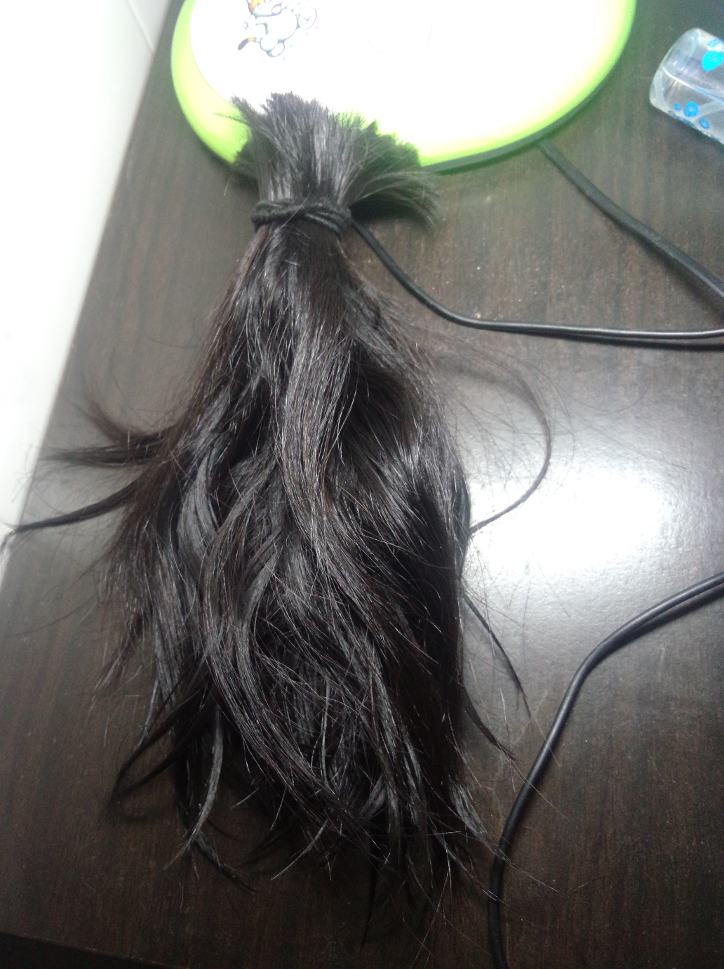 想捐头发,长度够了。没烫没染,但是做过倒模。