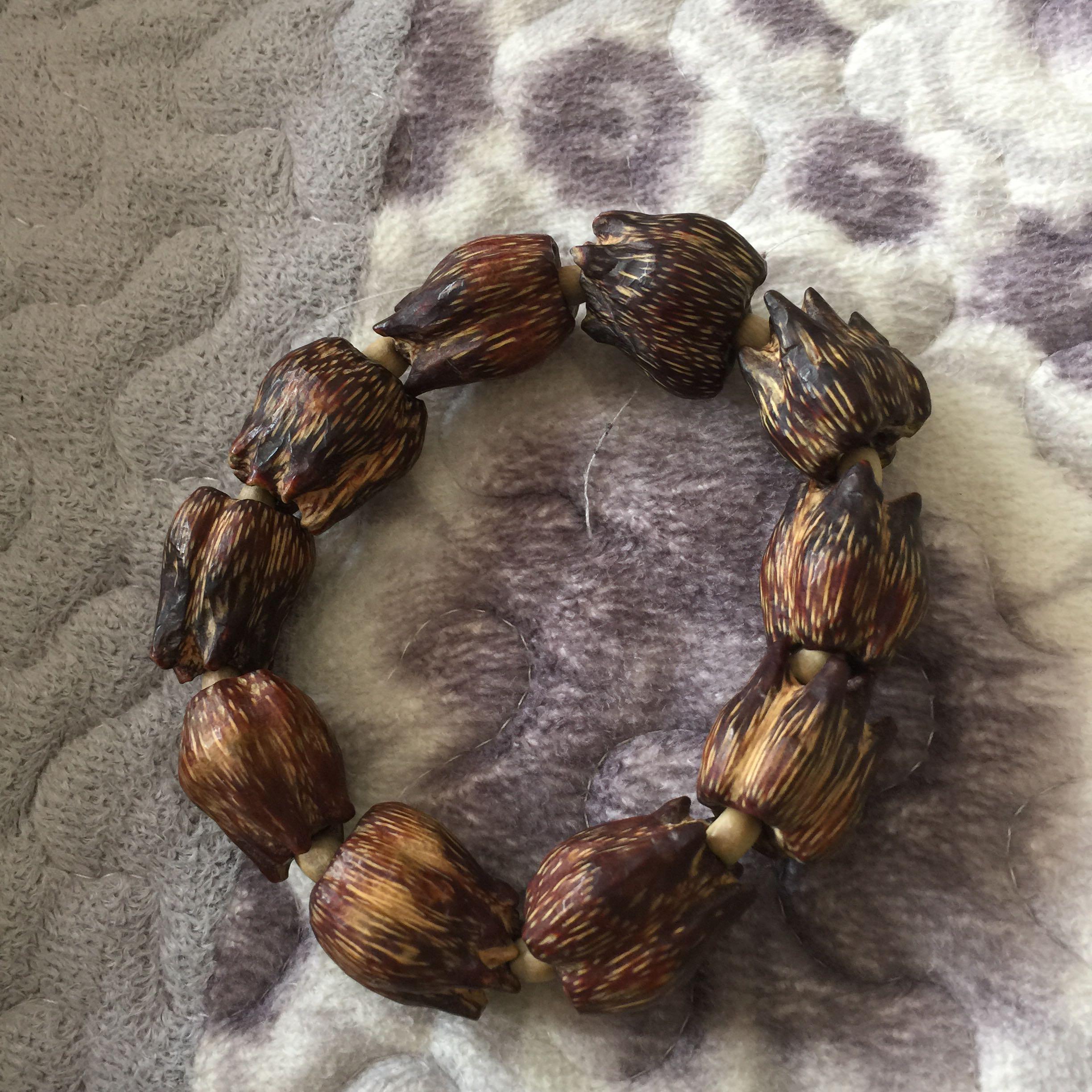 有一种像花朵一样的植物籽核可以串手串是什么籽