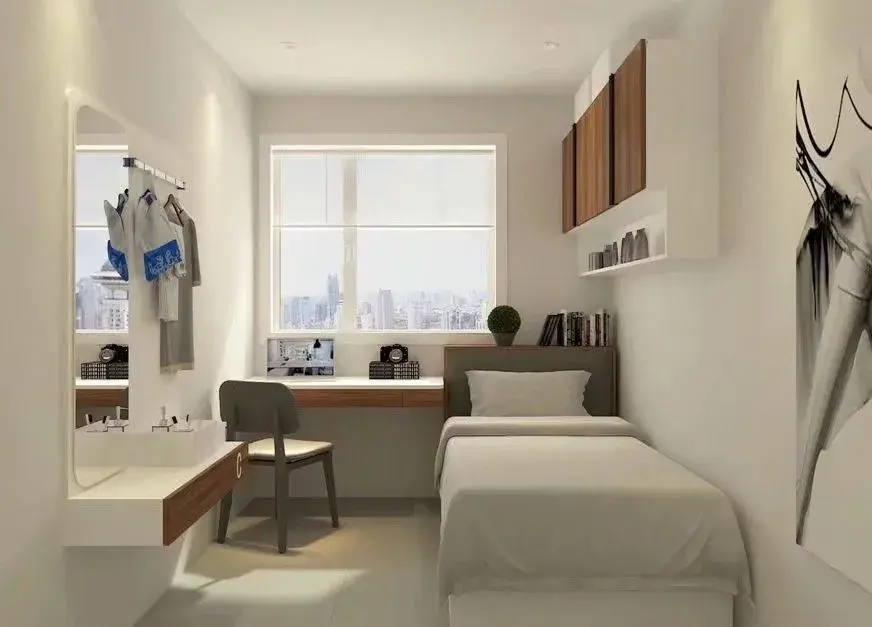 宿舍均为单人间,五个单人间成一套间,共用一个客厅与两个卫生间,简直