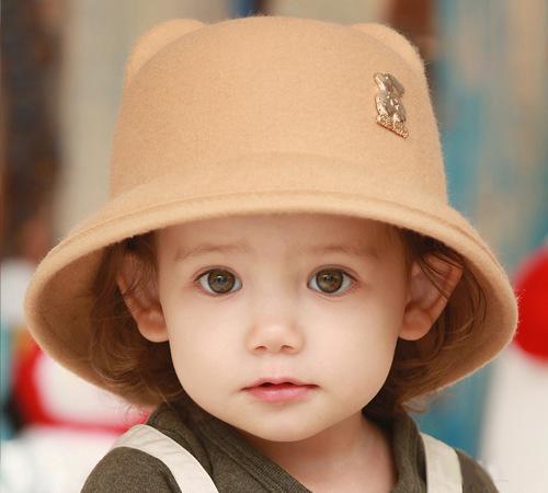 一个萌小孩头像戴帽子图片