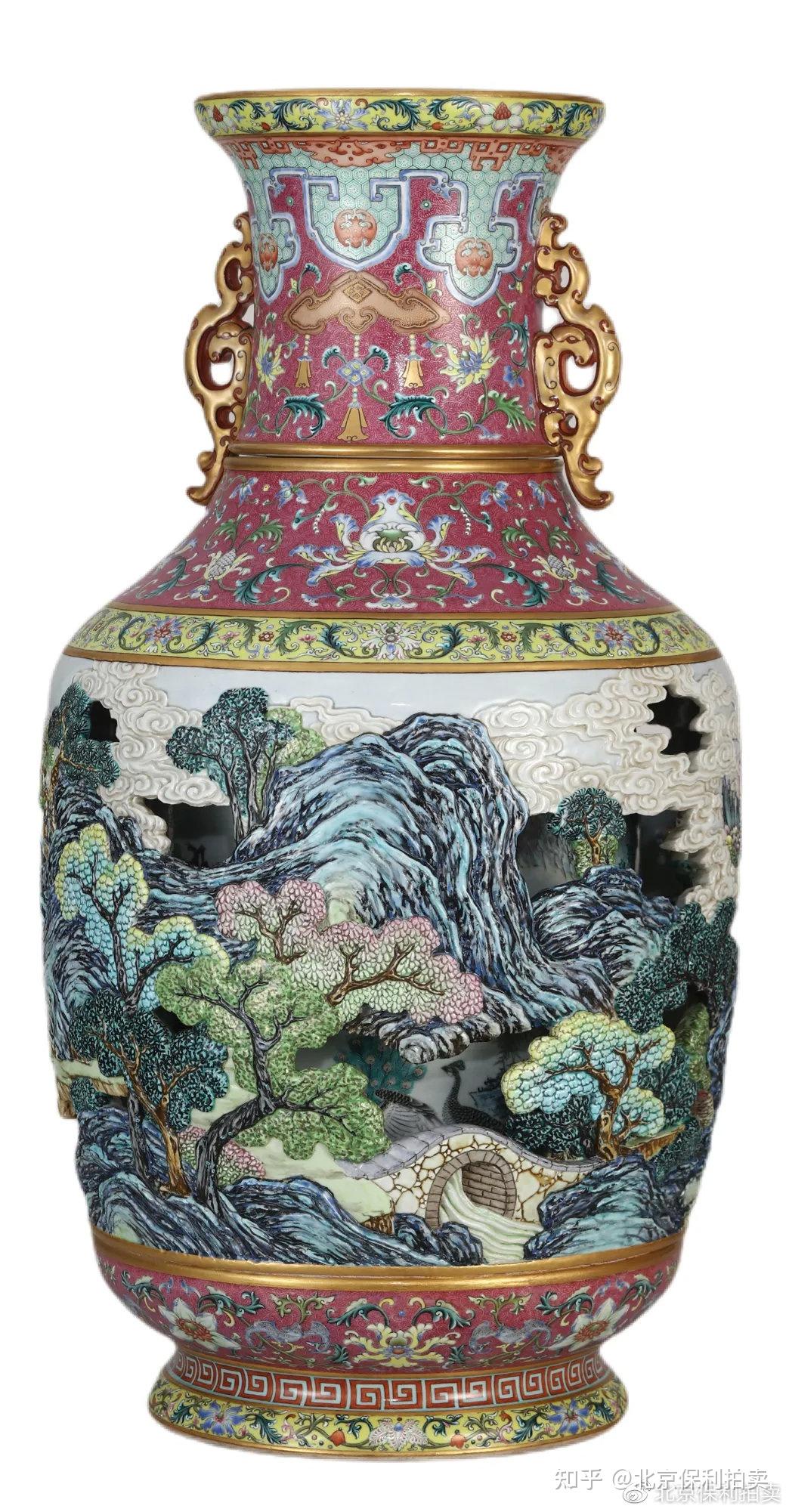 清乾隆御制洋彩胭脂红地轧道雕瓷镂空有凤来仪百鸟朝凤图双螭耳大转心