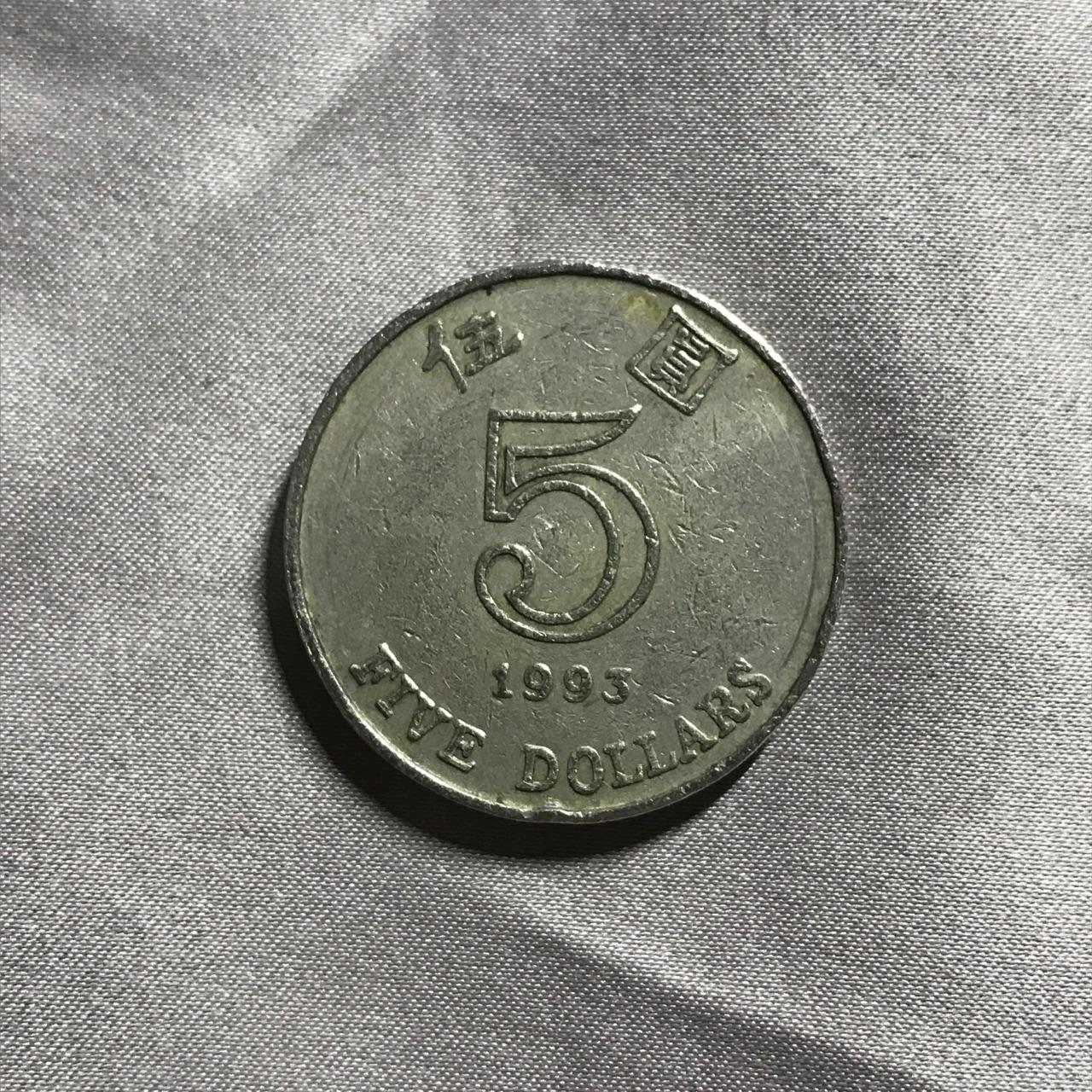 93年香港还没有回归，为什么这枚港币的背面是紫荆花而不是女王头？ - 知乎