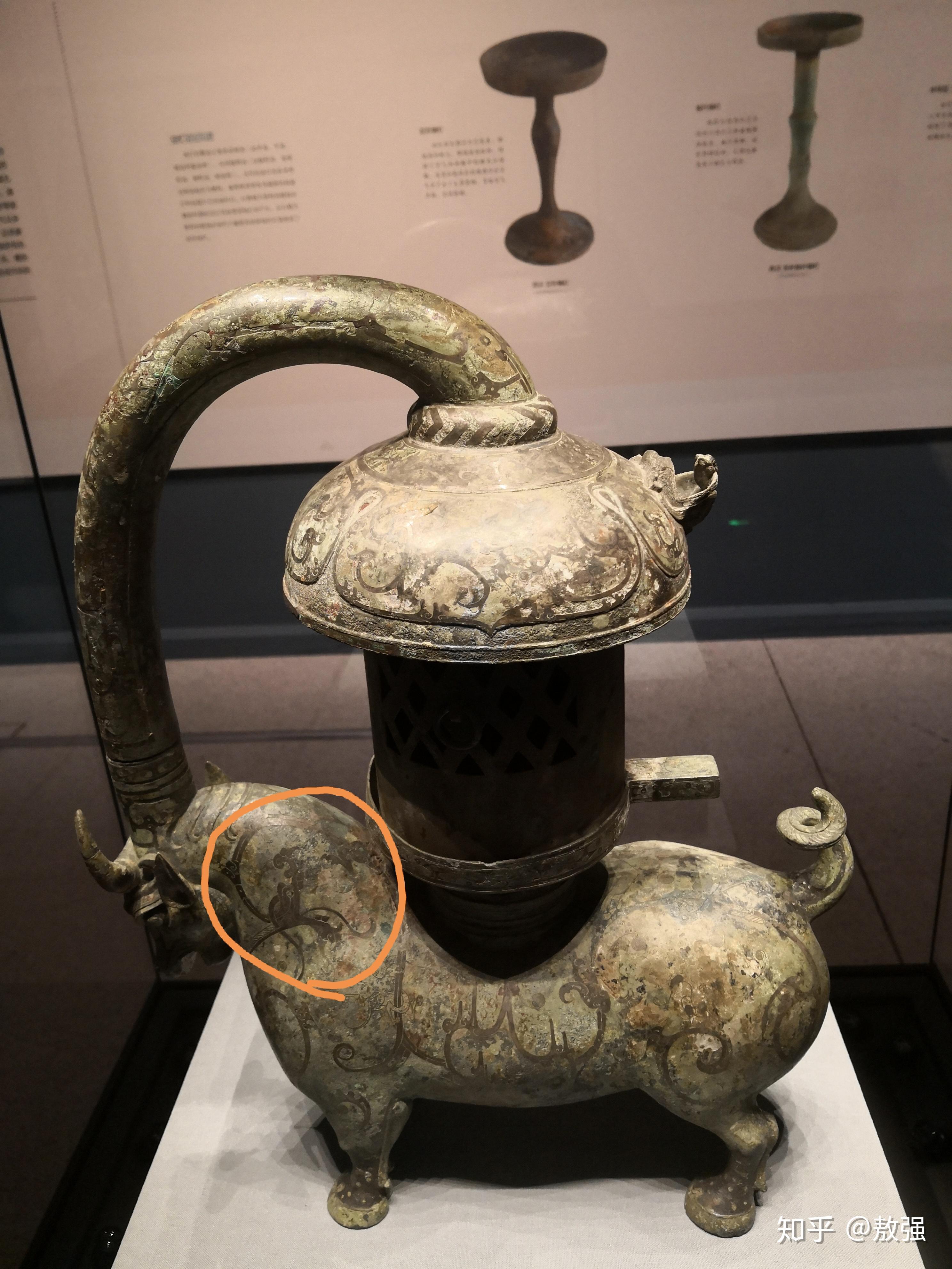 从龙的形象来判断江苏扬州甘泉二号东汉墓出土错银铜牛灯的年代