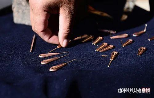 「口弦」中国少数民族用什么乐器来
