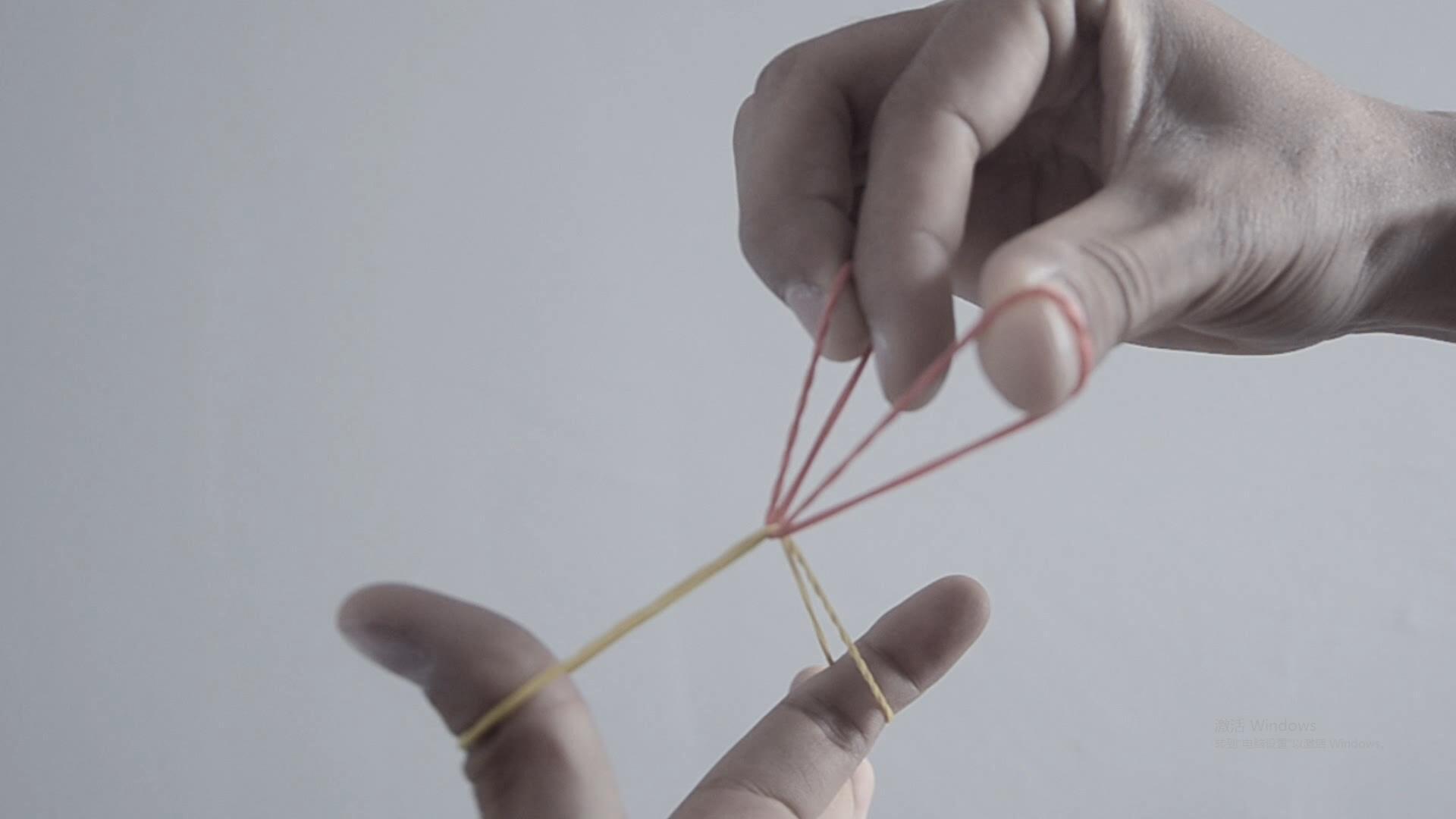 魔术教学橡皮筋穿越橡皮筋刘谦春晚表演魔术节目之一