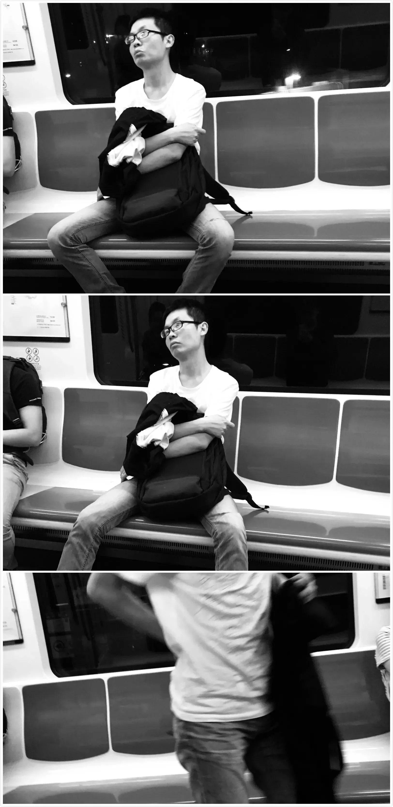 末班车上,一个戴着深度近视眼镜,程序员模样的年轻人在梦中被报站声