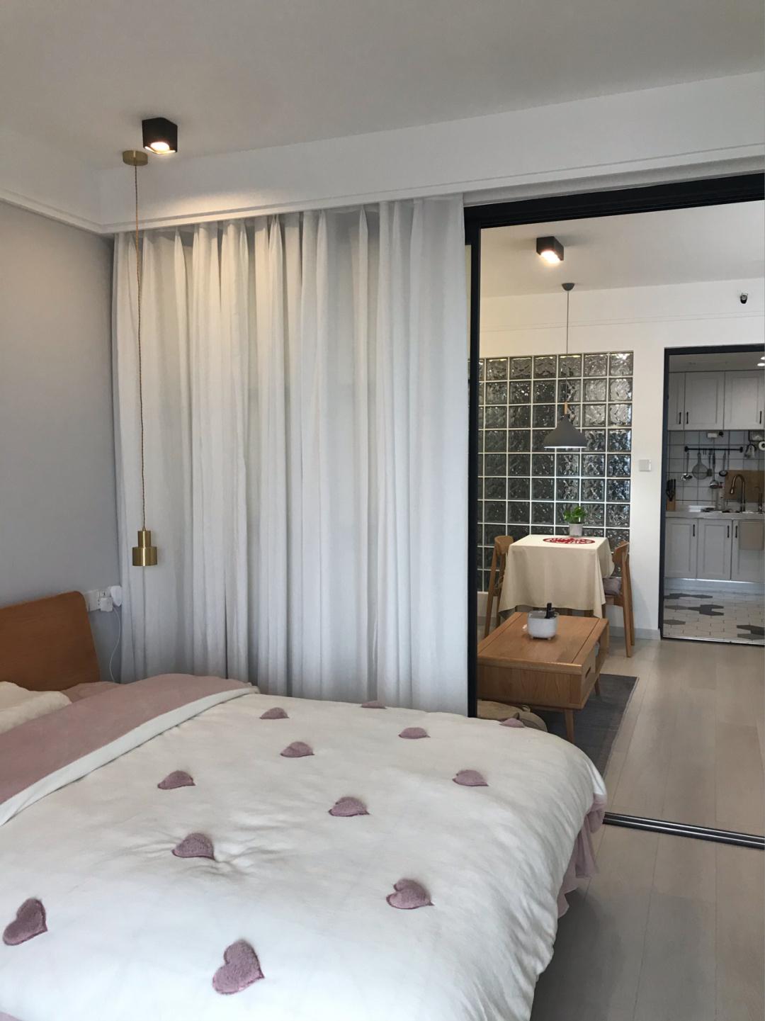 56平小户型大通间一个小方法巧妙化解卫生间采光问题