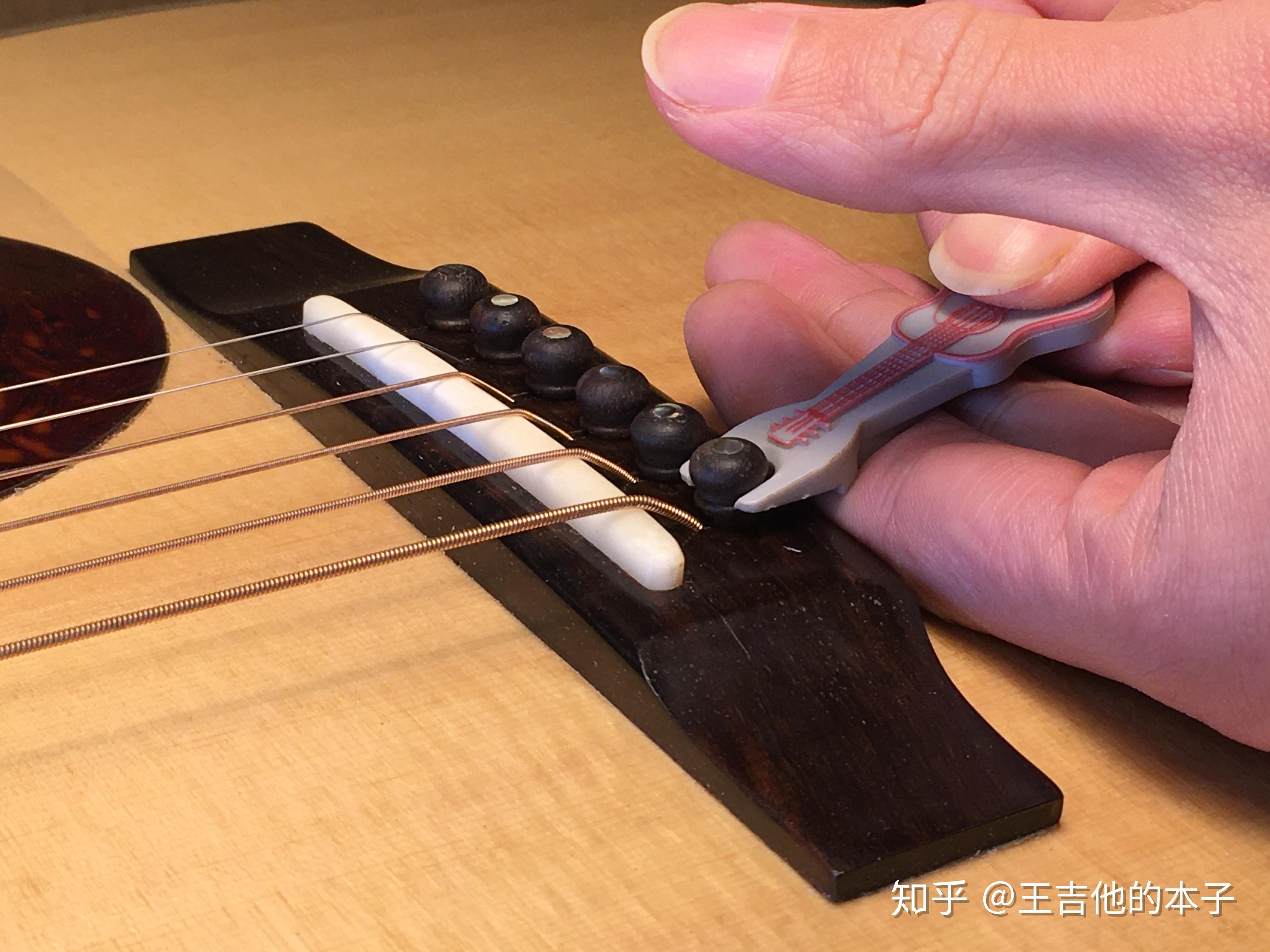 如何为吉他更换琴弦