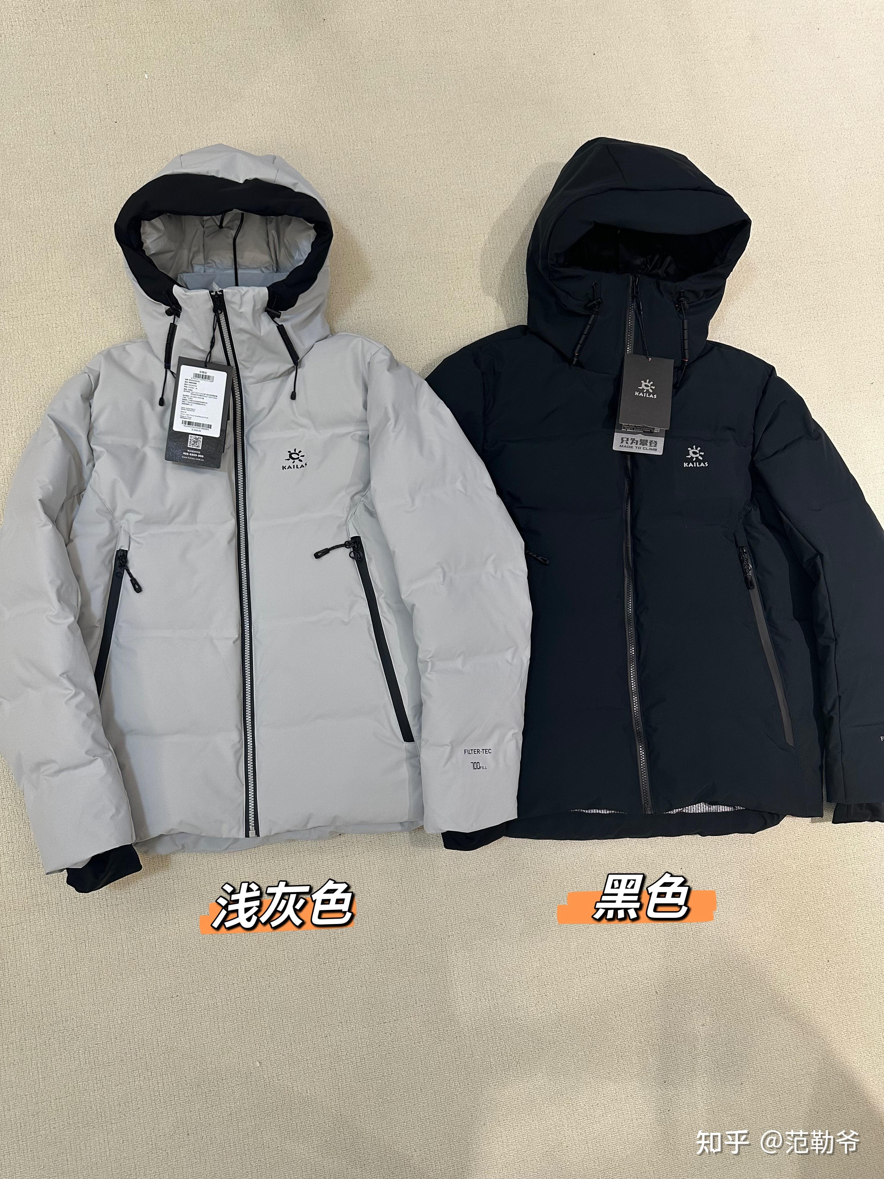 白色雪山标志的羽绒服图片