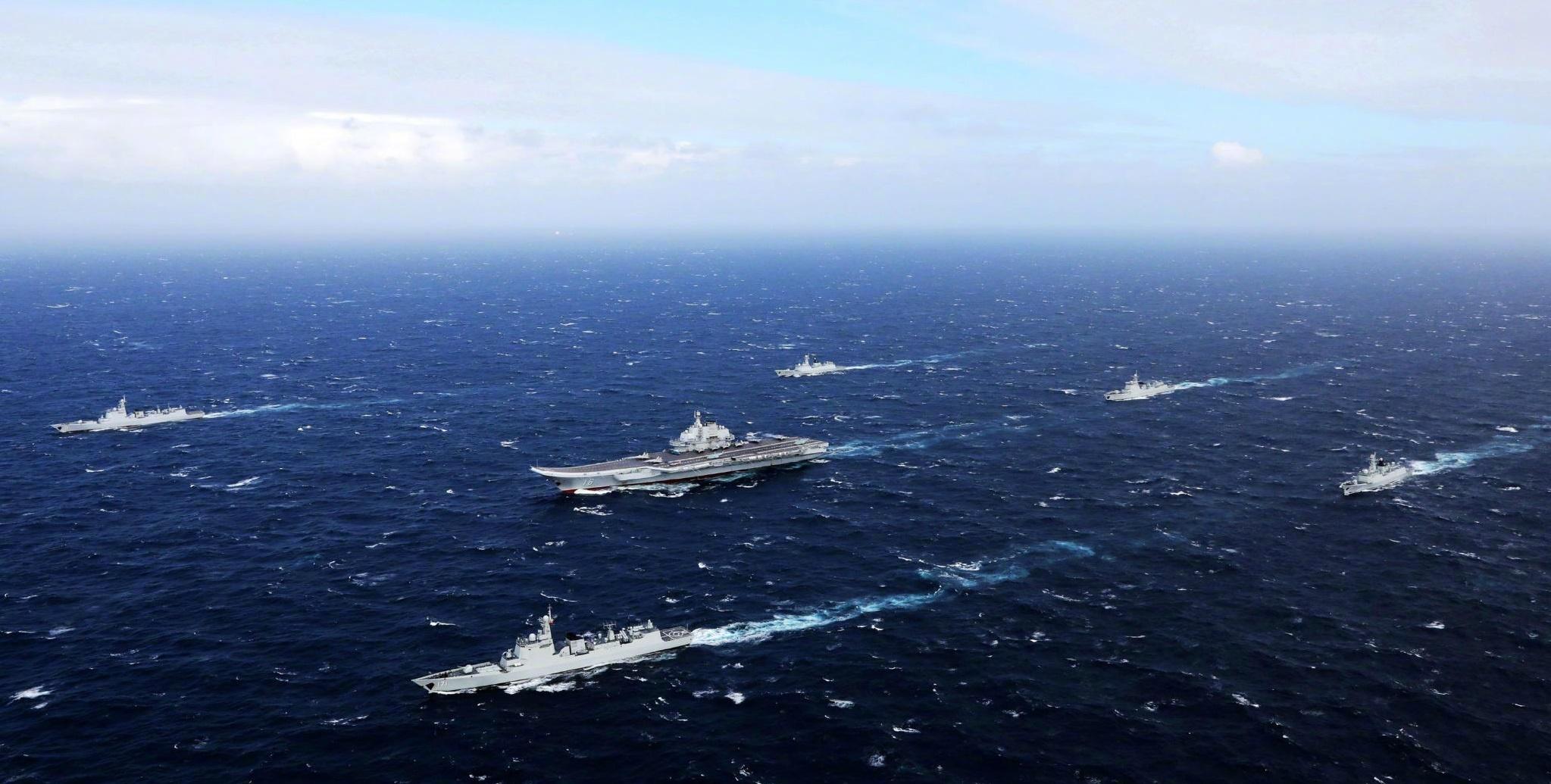 辽宁舰航母战斗群辽宁舰没有自乱阵脚,一架一架地起飞j15.