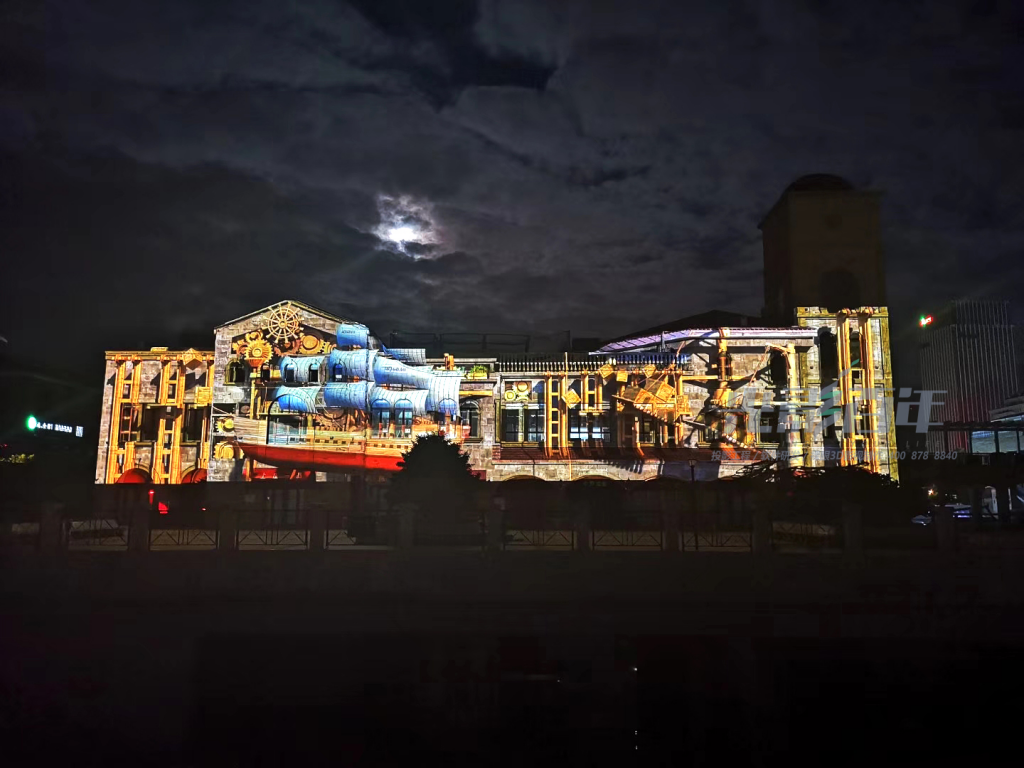 建筑墙面投影一般会先制作片源,在墙体投影出动感性极强的视觉影像