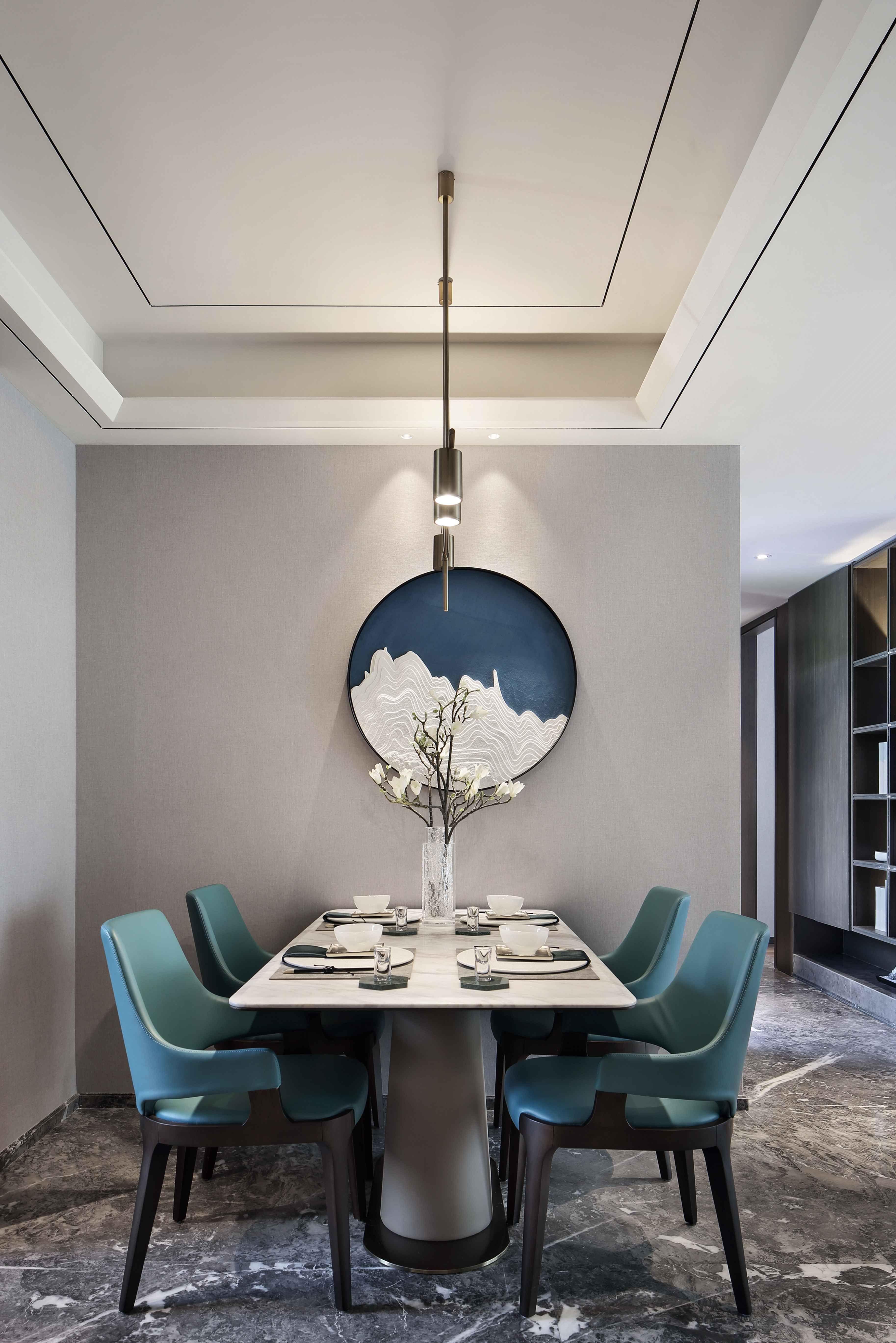 餐厅墨色大理石纹理的电视背景墙,如墨滴入白纸晕染成荫.