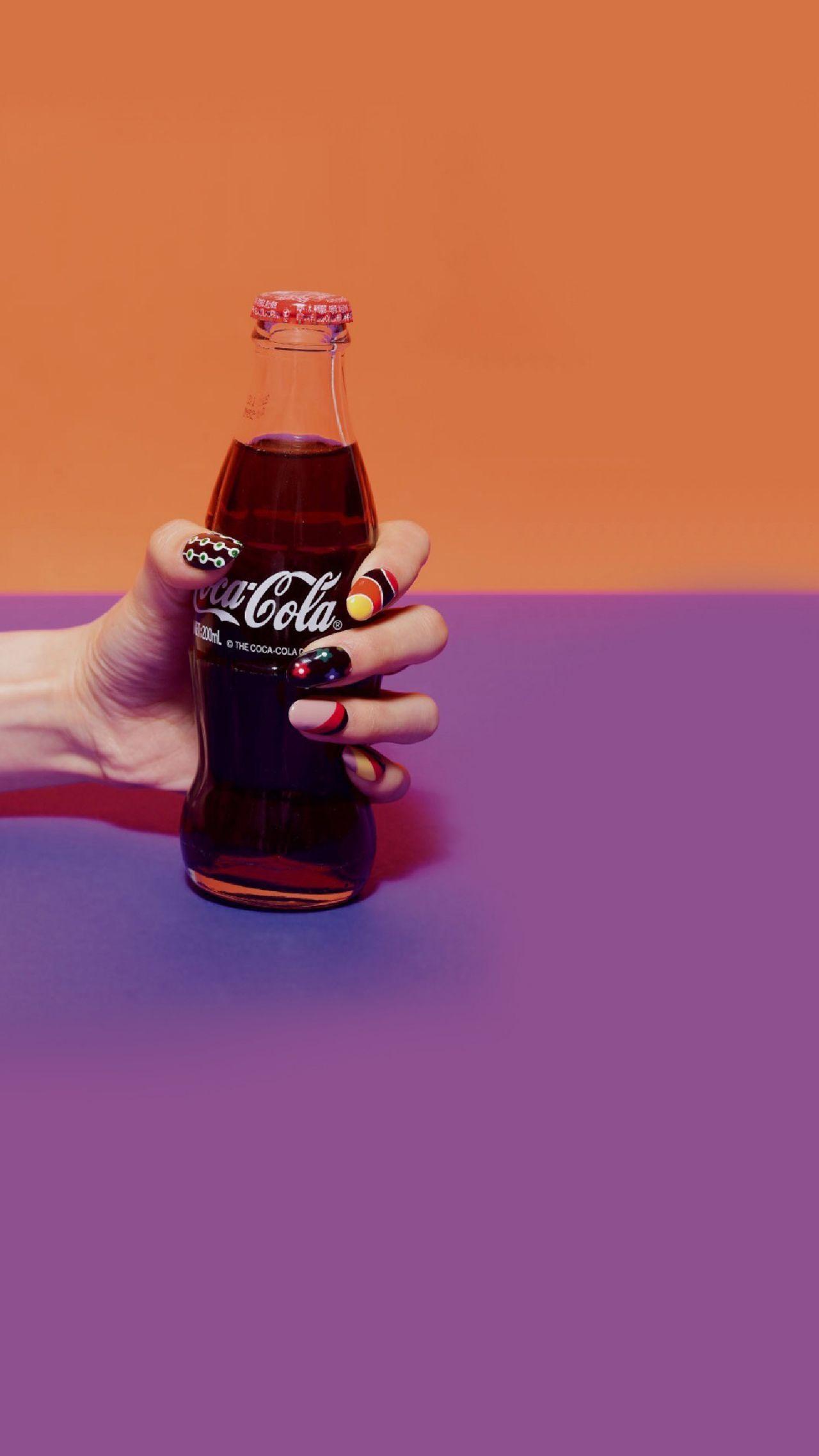 手握可乐的唯美图片图片