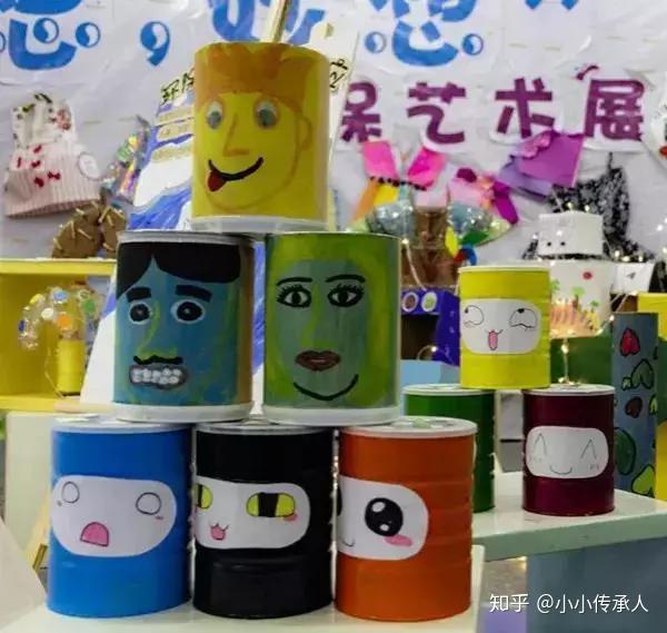 废旧报纸包裹出一辆绿色出行使者;炫彩瓶盖畅想出一曲锦鲤浅跃的乐章