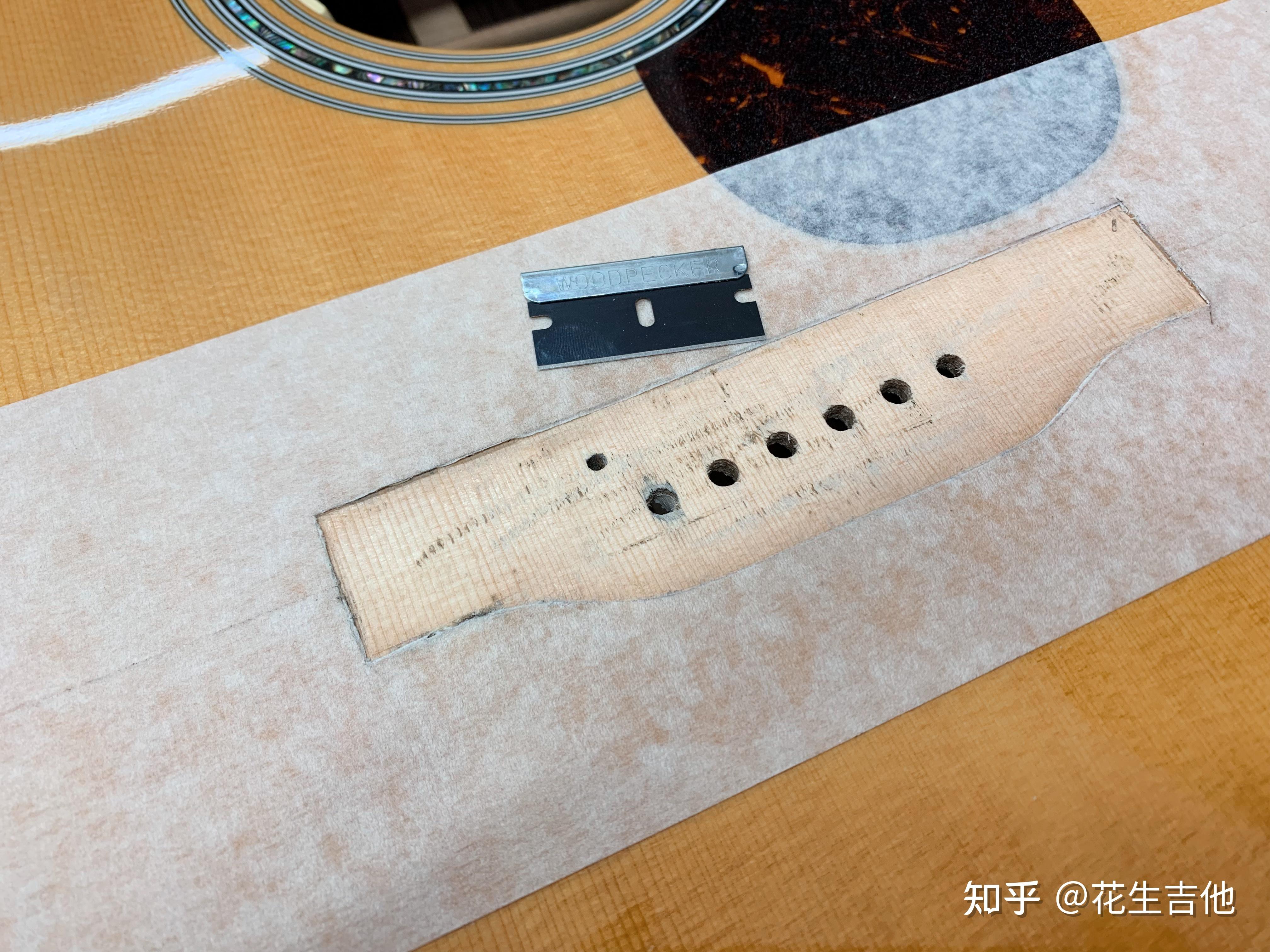 胶和找平的工作重新黏合琴桥制作一个新的牛骨下弦枕维修完成后的吉他