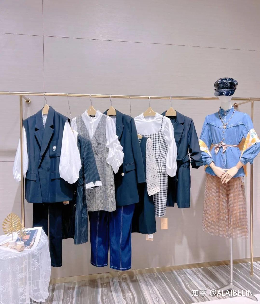 拉素juesue春装品牌折扣女装风衣连衣裙上衣裤裙穿搭