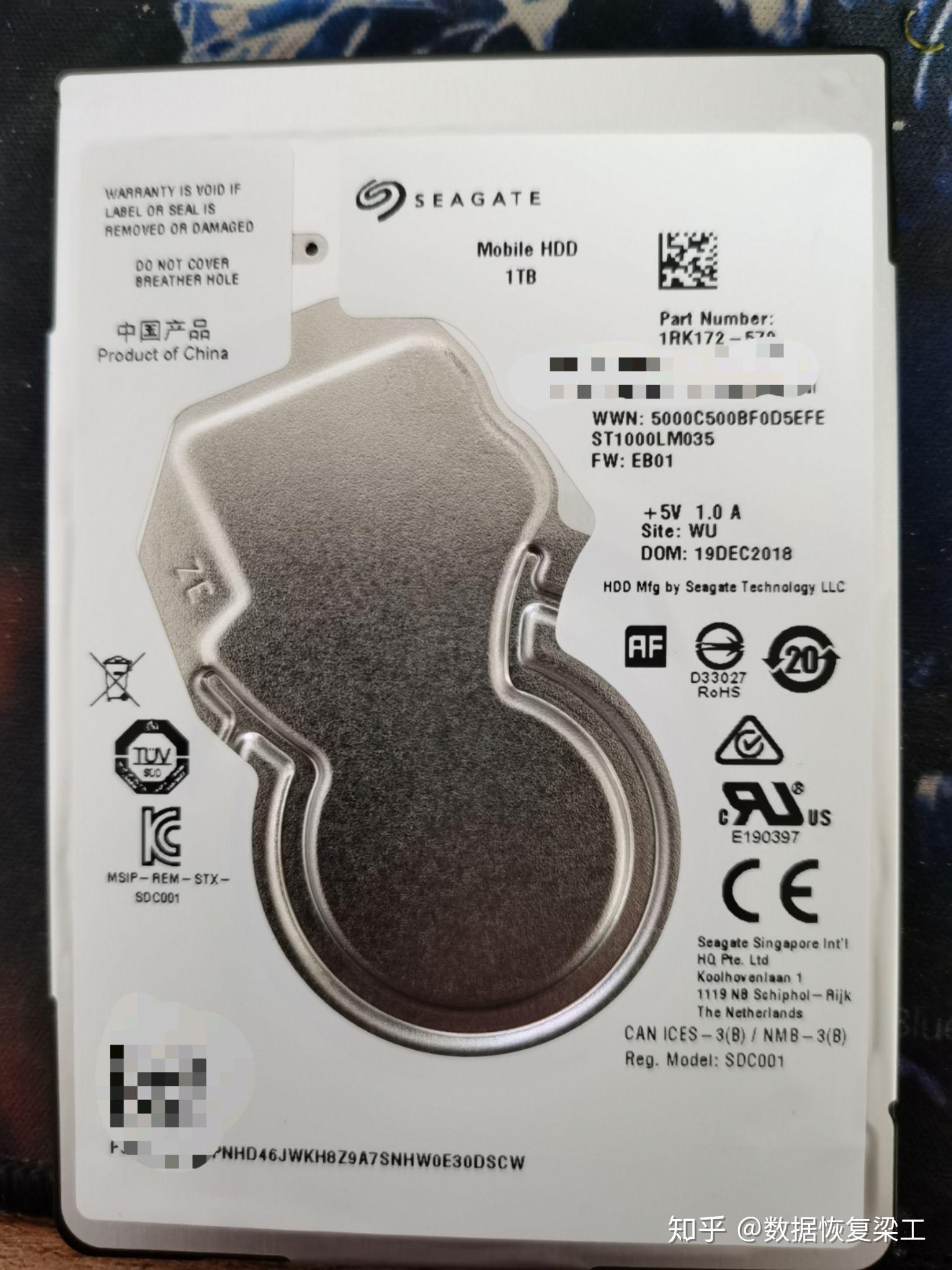 西安客户,新款叠瓦式希捷移动硬盘st1000lm035,客户说通电咔咔异响,带
